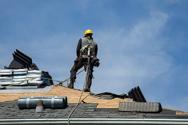 Professional Roof Repair technician working in Mineola, NY